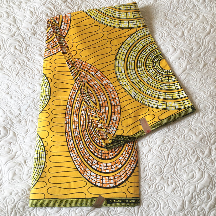 Yellow wheel African-fabric. 100% cotton